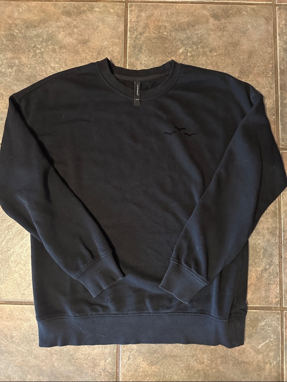 Minimal Black Crewneck Sweatshirt with Tonal Bird Embroidery